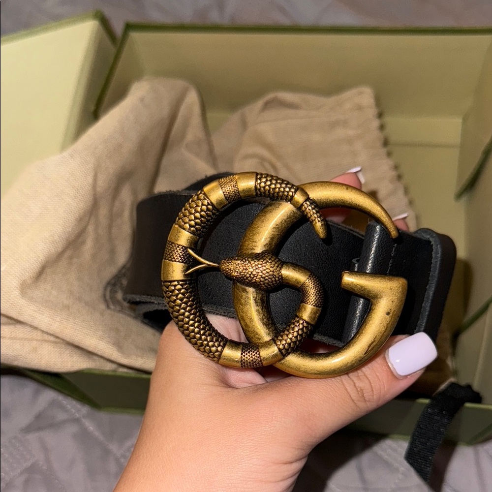 Gucci Black and Gold Leather Belt with Iconic GG Buckle